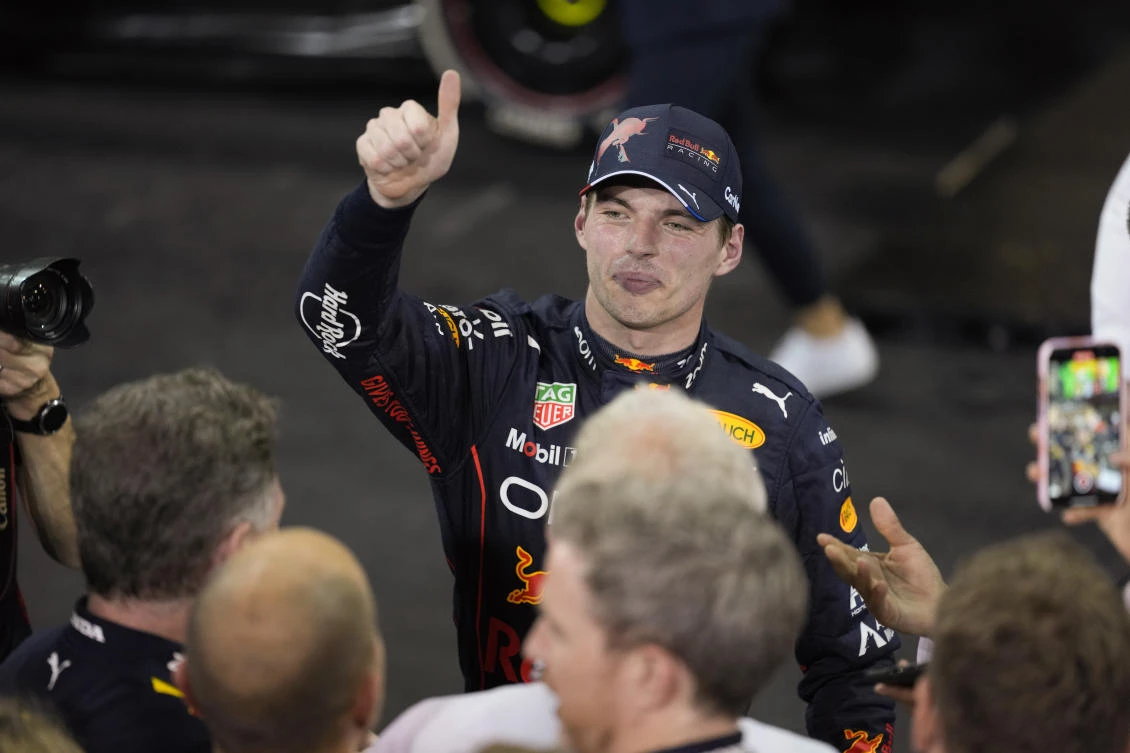Red Bull driver Max Verstappen of the Netherlands celebrates after he won the Formula One Abu Dhabi Grand Prix, in Abu Dhabi, UAE. (AP)