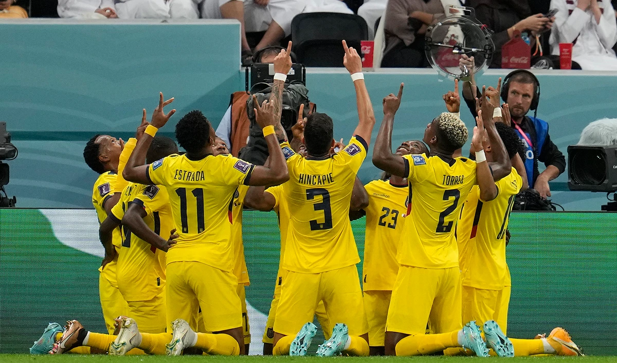 Ecuador celebrates their opening goal by Enner Valencia during the World Cup, group A soccer match between Qatar and Ecuador at the Al Bayt Stadium in Al Khor, on November 20, 2022. (AP)