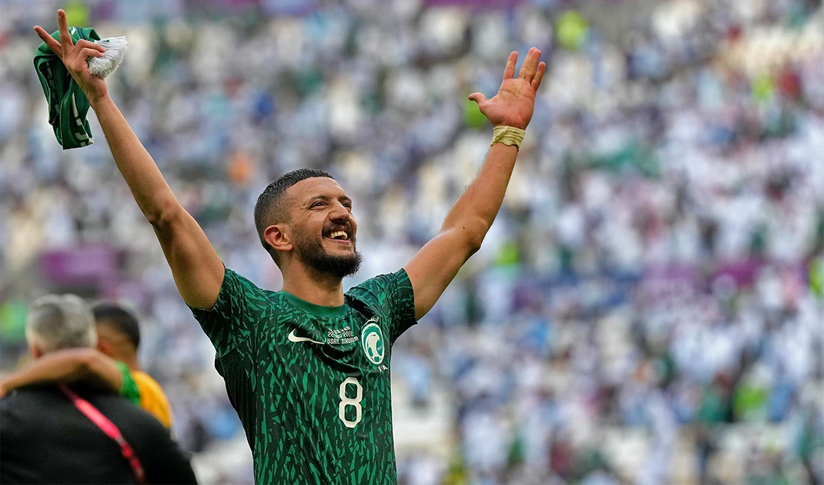 Saudi Arabia's Abdulelha Al-Malki celebrates at the end of the World Cup group C soccer match between Argentina and Saudi Arabia at the Lusail Stadium in Lusail, Qatar, on November 22, 2022. (AP)