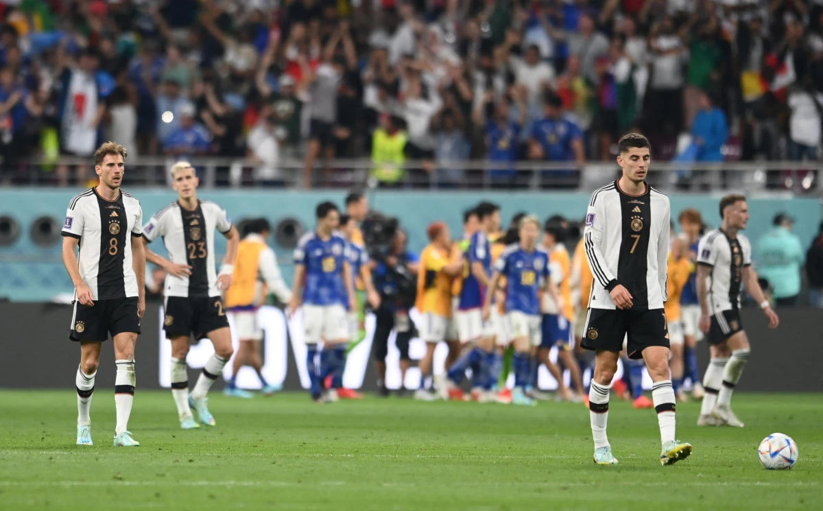 Germany’s Kai Havertz, Leon Goretzka and Nico Schlotterbeck look dejected after Japan’s Ritsu Doan scored their first goal during their FIFA World Cup Qatar 2022 match at Khalifa International Stadium, Doha on Wednesday. (Reuters)