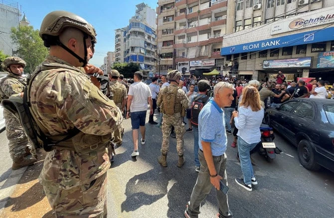 Bank raids return as Lebanese confront economic crisis