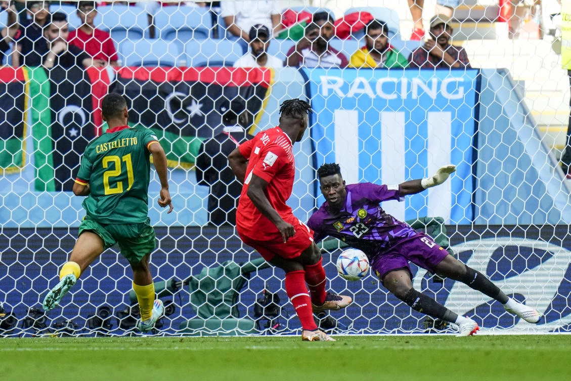 Switzerland’s Breel Embolo scores a goal during their World Cup group G match against Cameroon. (AP)