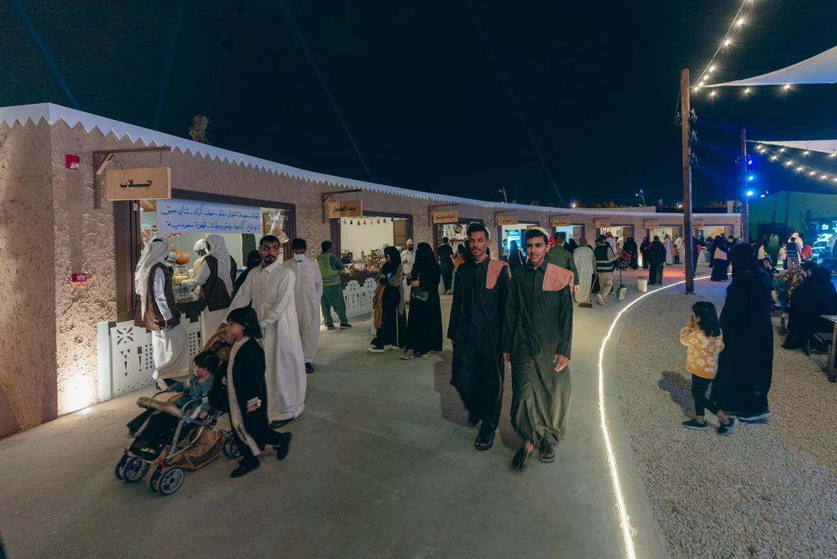 Visitors touring around Qariat Zaman, or “the old village”, that launched on Nov. 24 as a living record of the country’s history for Riyadh Season 2022. (Supplied)