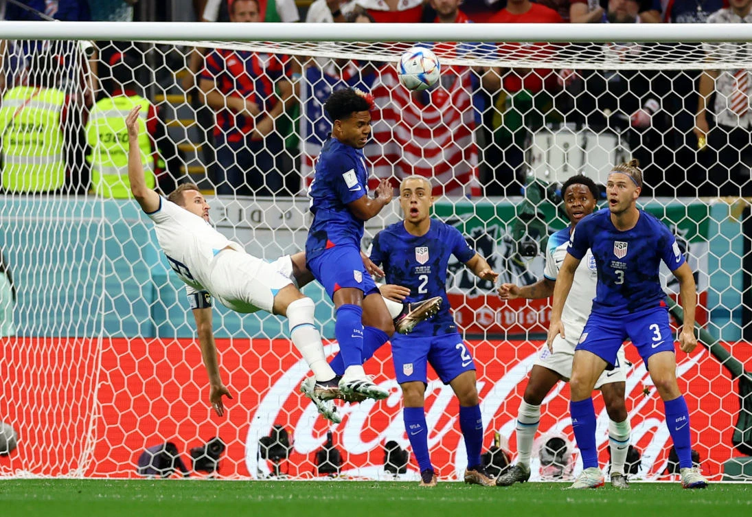 England’s Harry Kane in action with Weston McKennie of the US during their FIFA World Cup Qatar 2022 Group B match at Al Bayt Stadium, Al Khor on Friday. (Reuters)