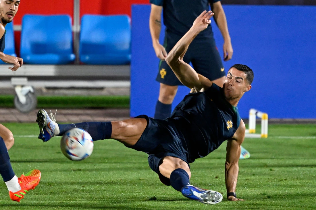 Portugal's forward Cristiano Ronaldo takes part in a training session with teammates at Al Shahania SC in Al Samriya Sunday, on the eve of match aginst Uruguay. (AFP)