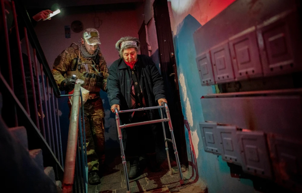 Elderly residents are evacuated from the southern city of Kherson, Ukraine, Sunday, Nov. 27, 2022. (AP)