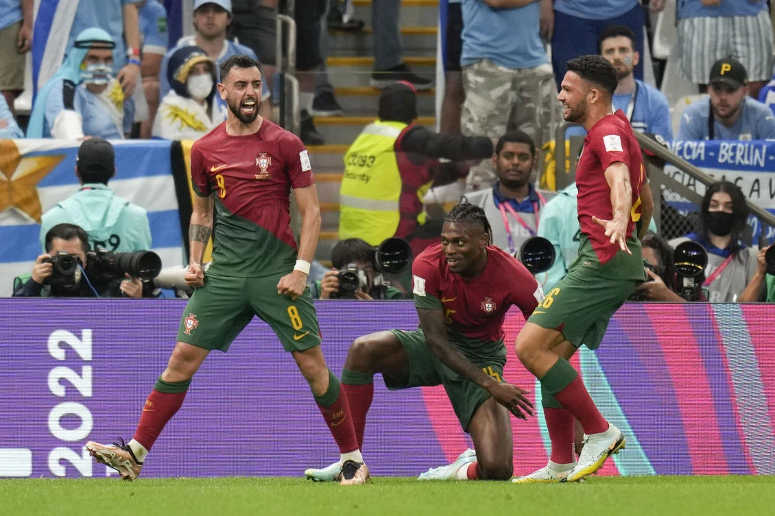 Portugal’s Bruno Fernandes celebrates scoring his second goal against Uruguay, Lusail Stadium, Lusail, Qatar, Monday, Nov. 28, 2022. (AP Photo)