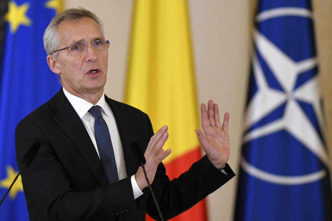 NATO Secretary-General Jens Stoltenberg gestures during joint statements with Romanian President Klaus Iohannis in Bucharest, Romania, Monday, Nov. 28, 2022. (AP)