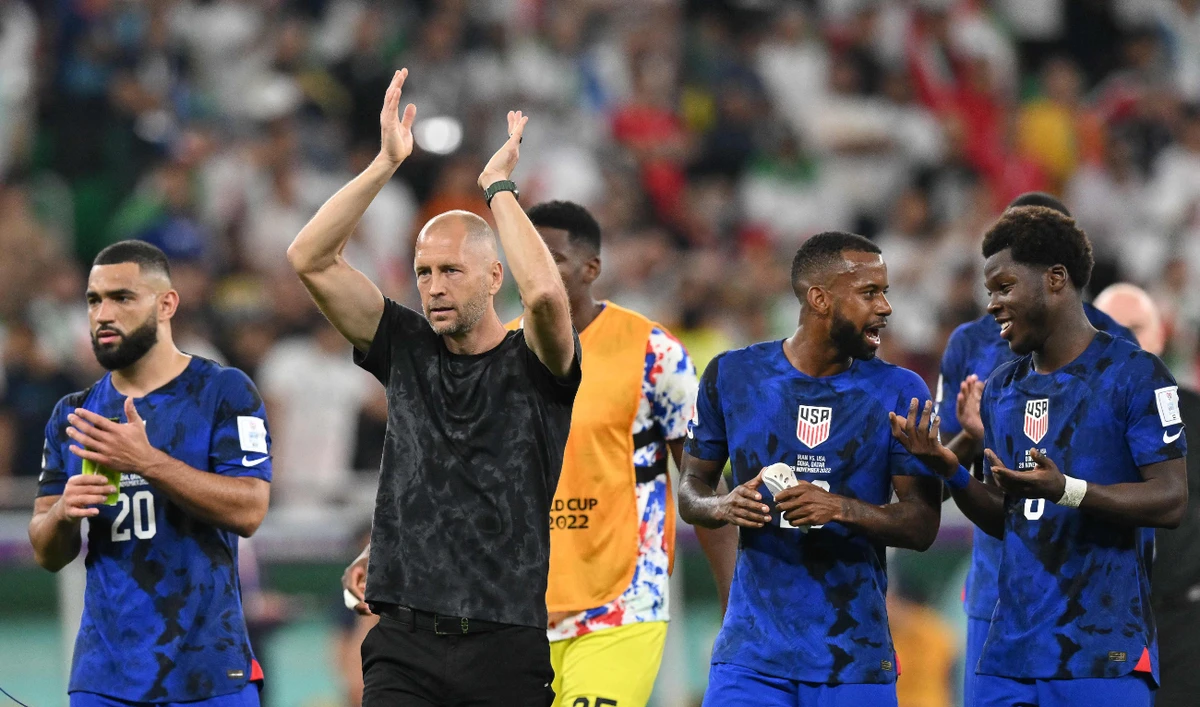 USA's coach Gregg Berhalter applauds the fans after the Q World Cup Group B football match against Iran at the Al-Thumama Stadium in Doha on Tuesday. (AFP)