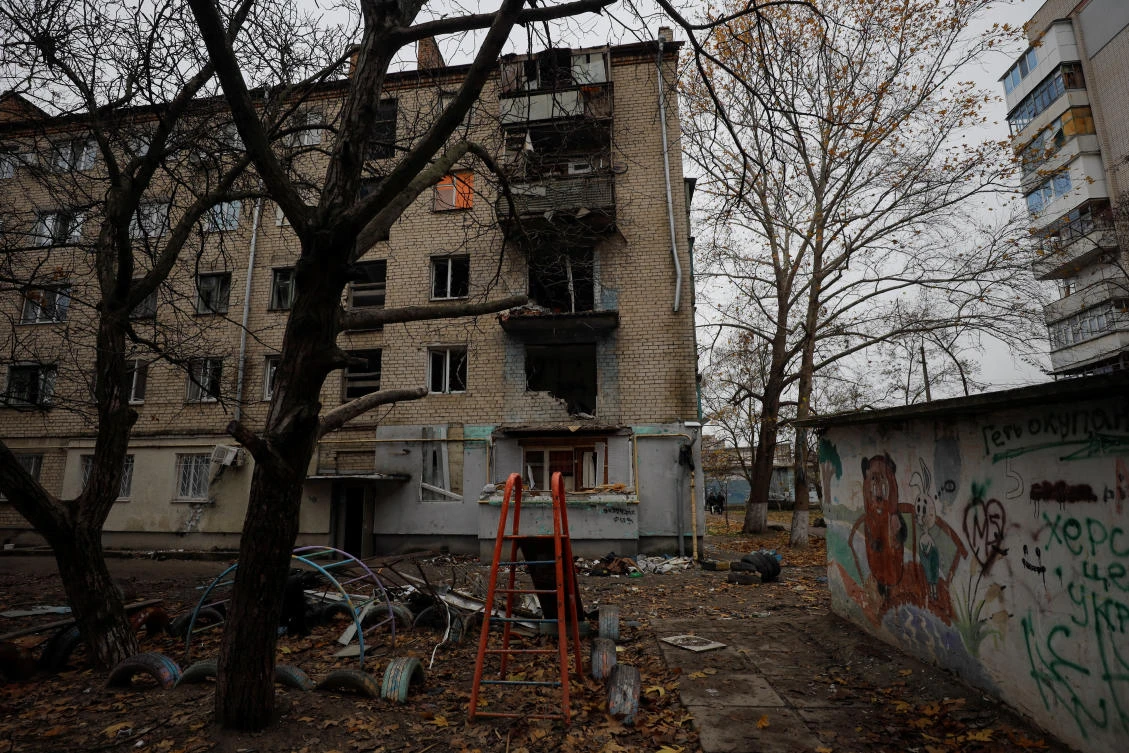 A view shows an apartment building damaged by a recent Russian military strike in Kherson, Ukraine on November 27, 2022. (Reuters)