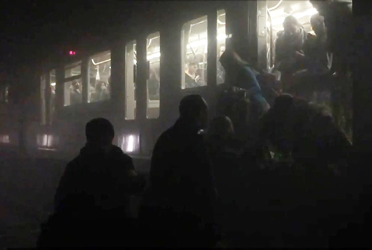 In this file video grab made on March 22, 2016 metro commuters evacuate from a subway train in Brussels after an explosion at the Maelbeek station. (AFP/File)