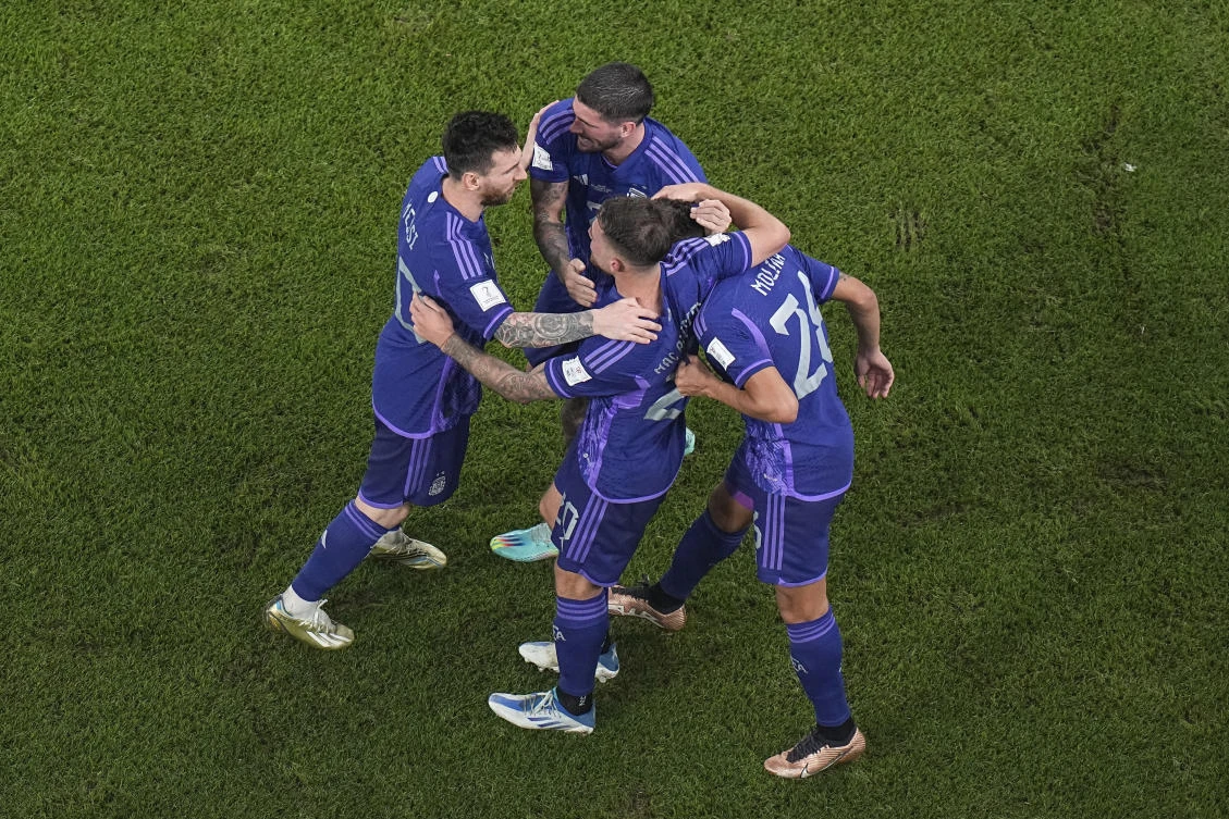 Messi and Argentina advance at World Cup, beat Poland 2-0