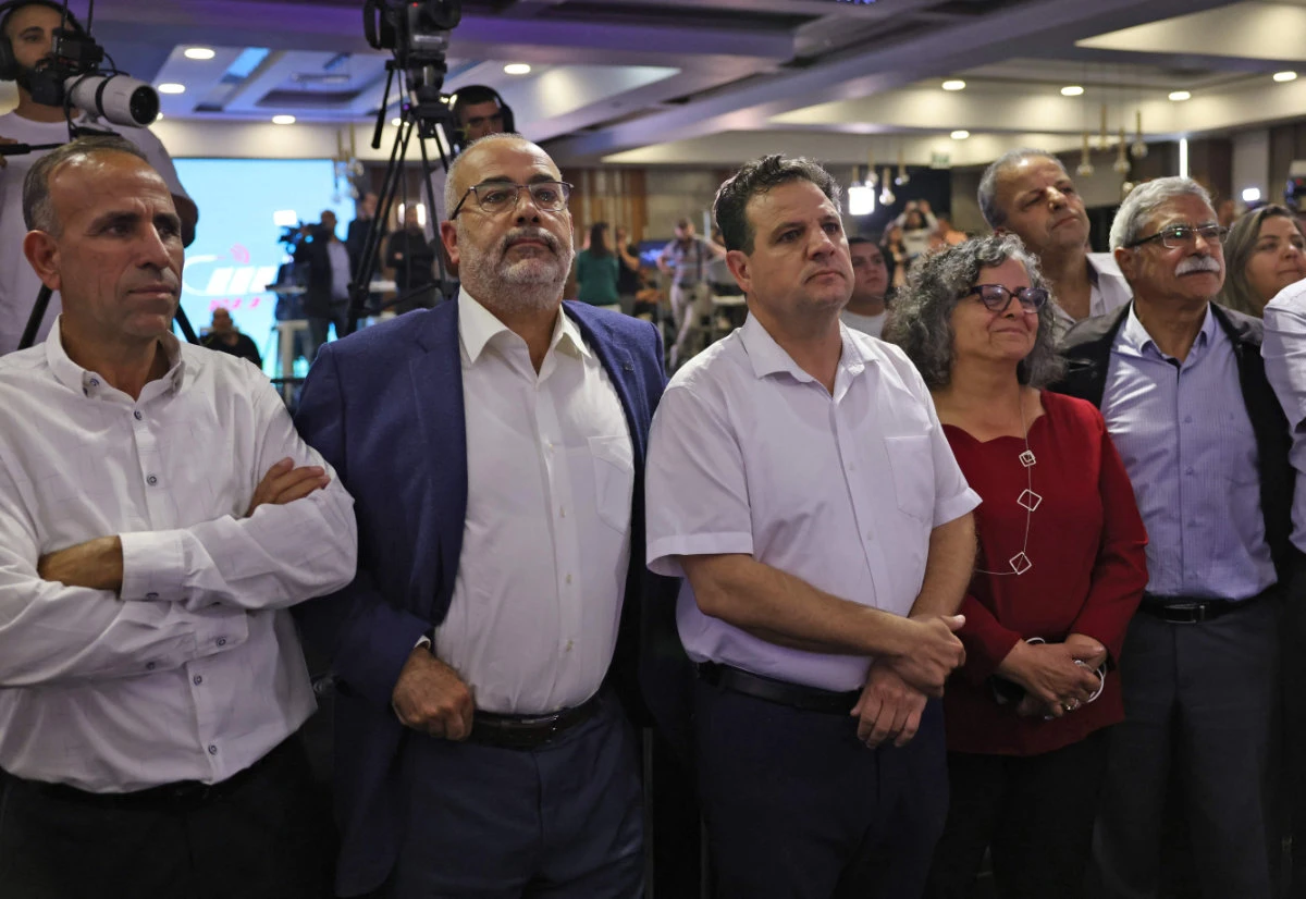 Supporters of Israel's Arab Front for Change (Hadash/Taal) gather Shefa Amr after polls closed on Nov. 1, 2022. (AFP)