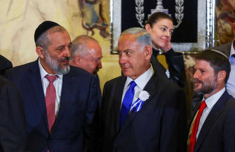 Aryeh Deri, Benjamin Netanyahu and Bezalel Smotrich, 25th Knesset swearing-in ceremony, Jerusalem, Nov. 15, 2022. (Reuters)