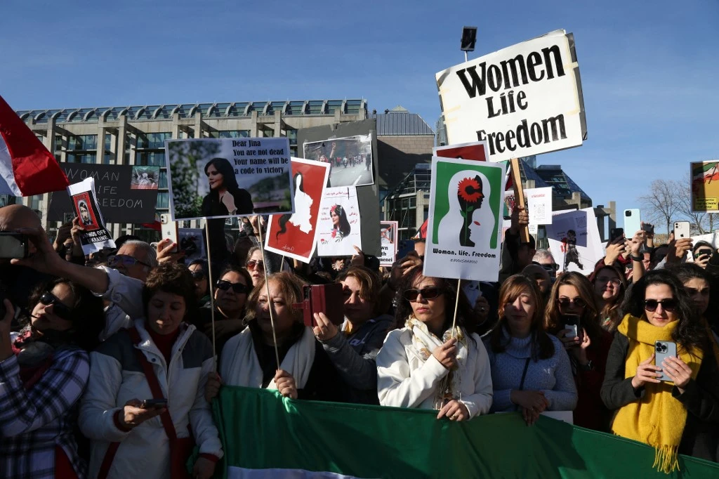 People rally in support of Iran in Ottawa, Canada. The protests in Iran continue to capture global attention. (File/AFP)