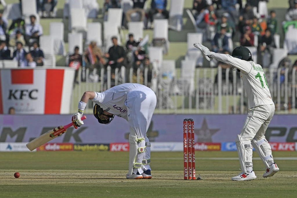 Pakistan’s wicketkeeper Mohammad Rizwan, right, makes a successful leg before wicket appeal against England’s Ben Duckett during the first day of their first Test match on Dec. 1, 2022. (AFP)
