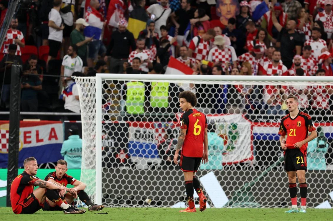 Belgium’s midfielder Axel Witsel and Timothy Castagne react after their World Cup Group F match against Croatia at the Ahmad Bin Ali Stadium in Al-Rayyan, Doha, on December 1, 2022. (AFP)