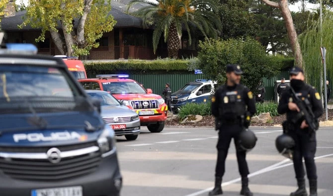 Spanish policemen secure the area after a letter bomb explosion at the Ukraine's embassy in Madrid on November 30, 2022. (AFP/File)