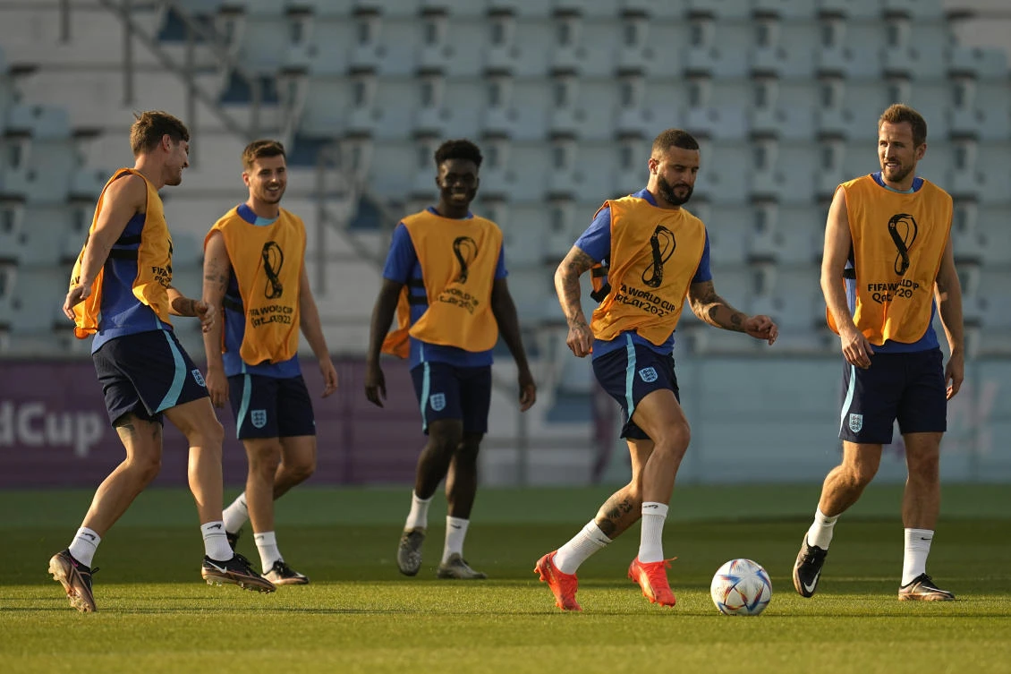 England’s Kyle Walker takes part in drills with teammates during a training session at Al Wakrah Sports Complex on the eve of their Round of 16 World Cup match against Senegal, in Al Wakarah on Saturday. (AP)
