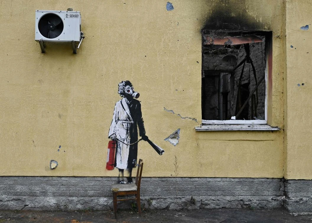 Ukraine detains 8 over Banksy mural theft