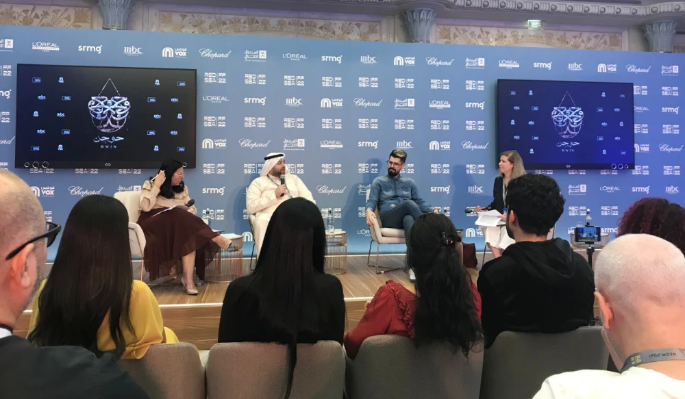 Translator Yasser Bahjatt and Director Yasir Al-Yasiri lead the discussion about the hit book and the process of making it into a movie. (AN photo)