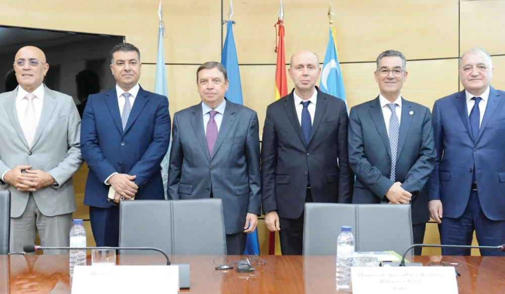 Officials pose for a group photo in Madrid, Spain. (Supplied)