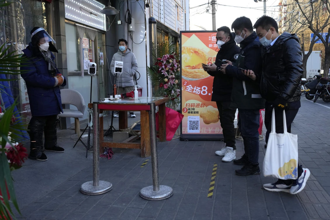 Many businesses have fully reopened in the capital Beijing. (AP)