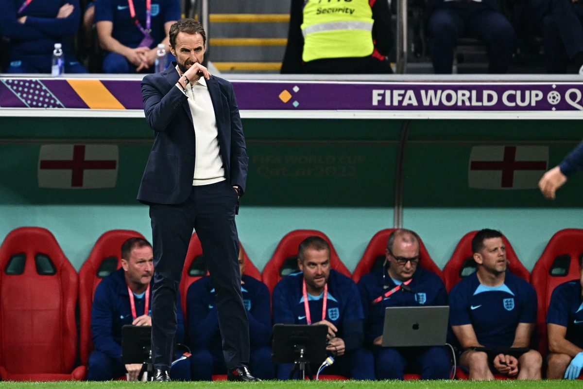 England's coach Gareth Southgate watches from the touchline during Qatar World Cup quarter-final match against France. AFP
