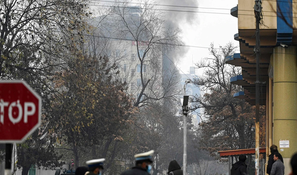 Smoke rises from a site of an attack at Shahr-e-naw which is city's one of main commercial areas in Kabul, Afghanistan on December 12, 2022. (AFP)