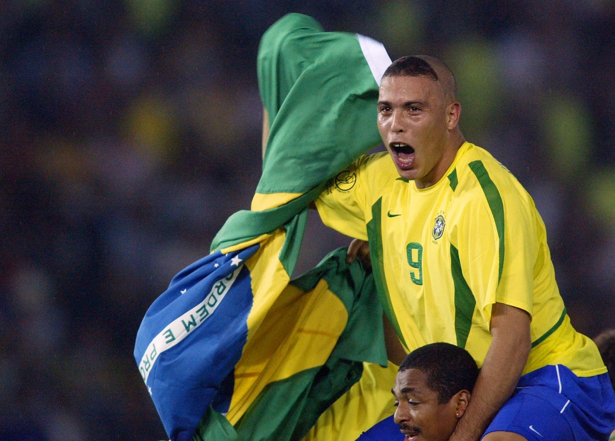 Ronaldo celebrates after Brazil won the World Cup final against Germany on June 30, 2002. Ronaldo is backing France as big favorites to win the Qatar 2022 World Cup. (AFP/File)