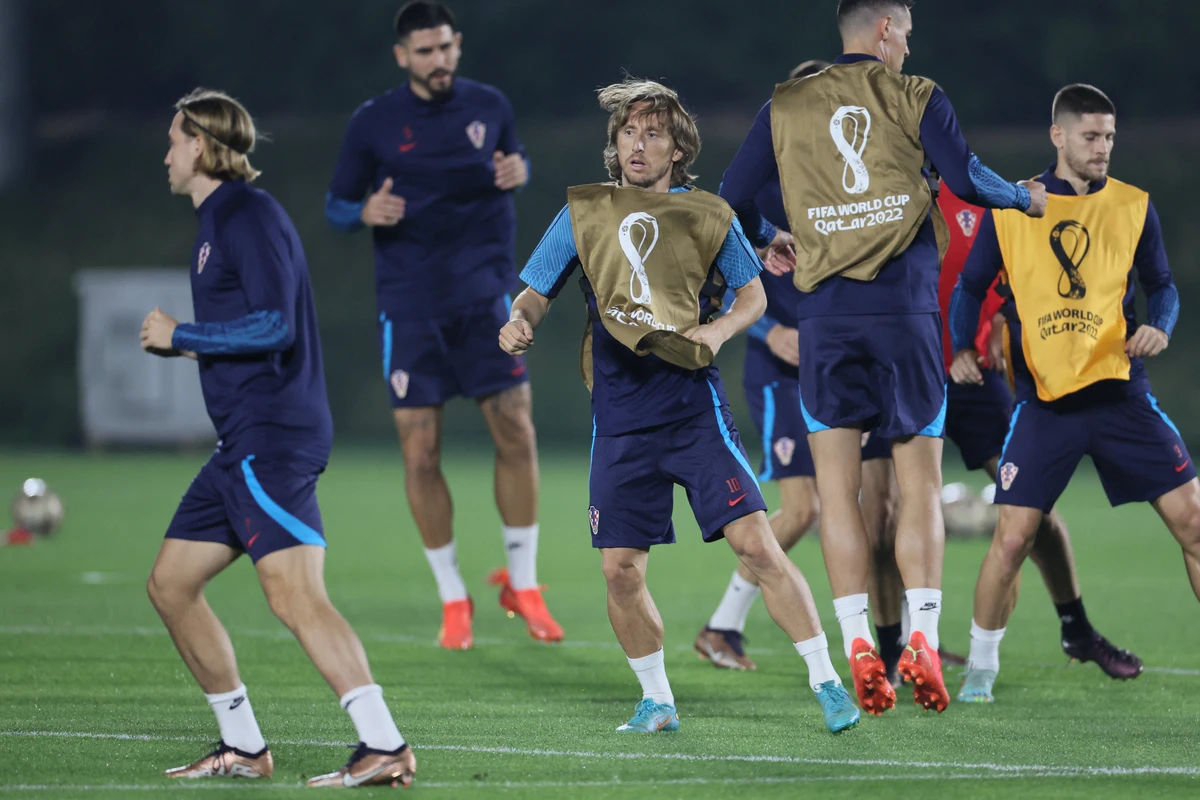 Croatia's Luka Modric takes part in a training session on the eve of Qatar World Cup semi final match against Argentina. AFP