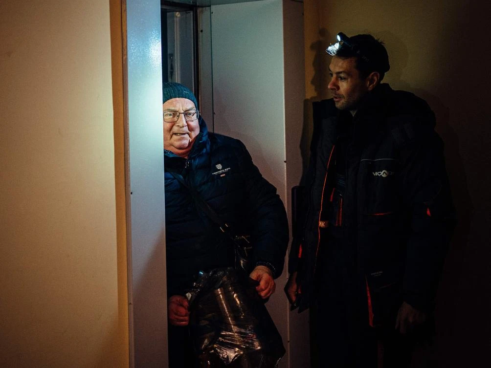 A 27-story walk home: Ukraine power cuts bring lifts to a halt