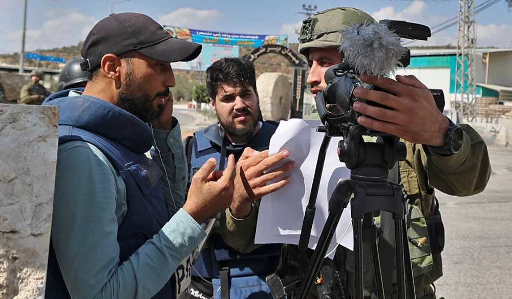 Palestinian journalists reel from attacks by Israeli forces