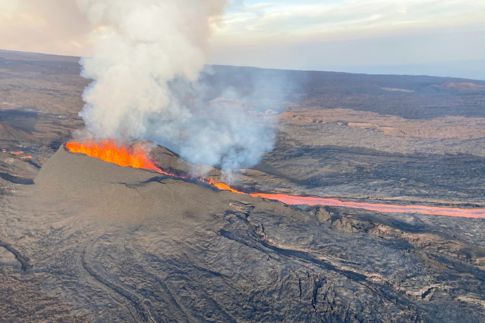 In this aerial image provided by the U.S. Geological Survey, fissure 3 is seen erupting on the Northeast Rift Zone of Mauna Loa on the Big Island of Hawaii, Wednesday, Dec. 7, 2022. (AP)