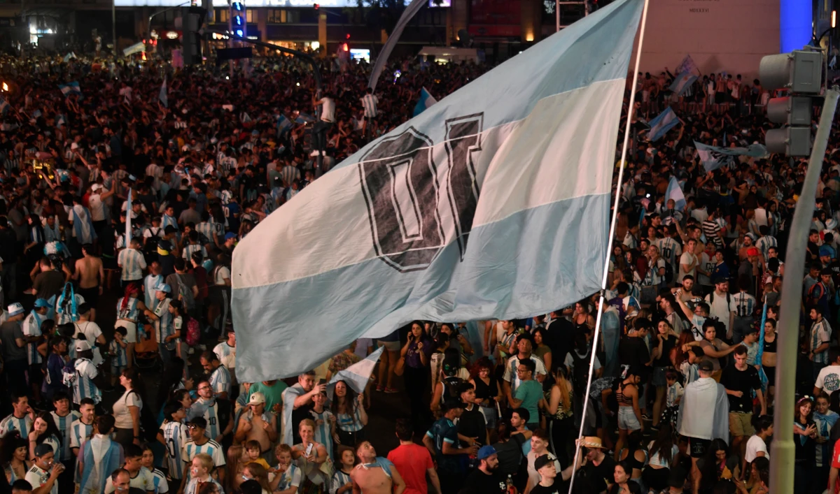 Argentina soccer fans celebrate their team's victory in the World Cup semifinal match against Croatia at the Obelisk in Buenos Aires on Tuesday. (AP)