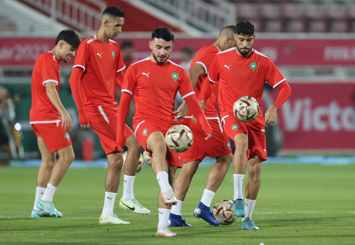 Morocco's players take part in a training session on the eve of the Qatar 2022 World Cup semi-final match against France. AFP