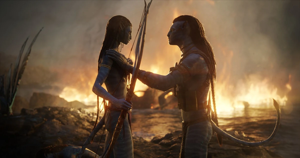 Zoe Saldana and Sam Worthington in ‘Avatar: The Way of Water.’ (20th Century Studios)