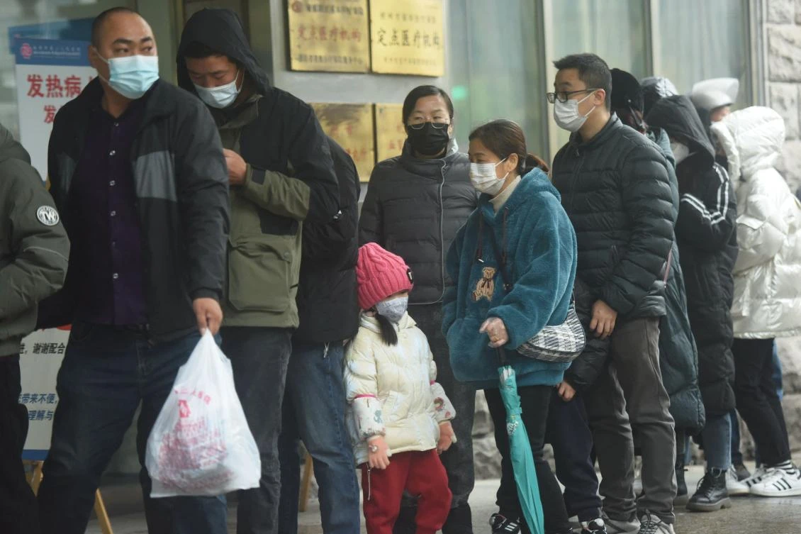 China reported 2,157 new symptomatic COVID-19 infections for Dec. 15 compared with 2,000 a day. (AFP)