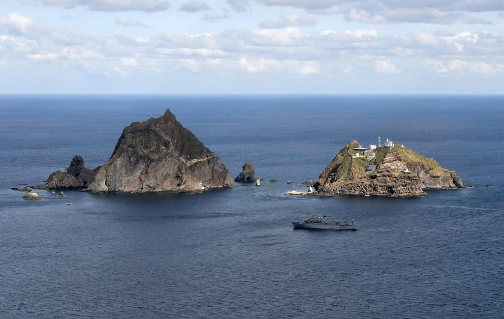 Above, the disputed islands known as Dokdo in South Korea and Takeshima in Japan. (Korea Coast Guard/AFP file photo)