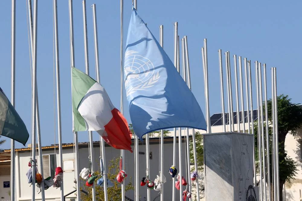 The Irish and UN flags are flown half-mast at the UNIFIL’s headquarters in the southern Lebanese town of Naqoura on Dec. 16 2022. (AFP)