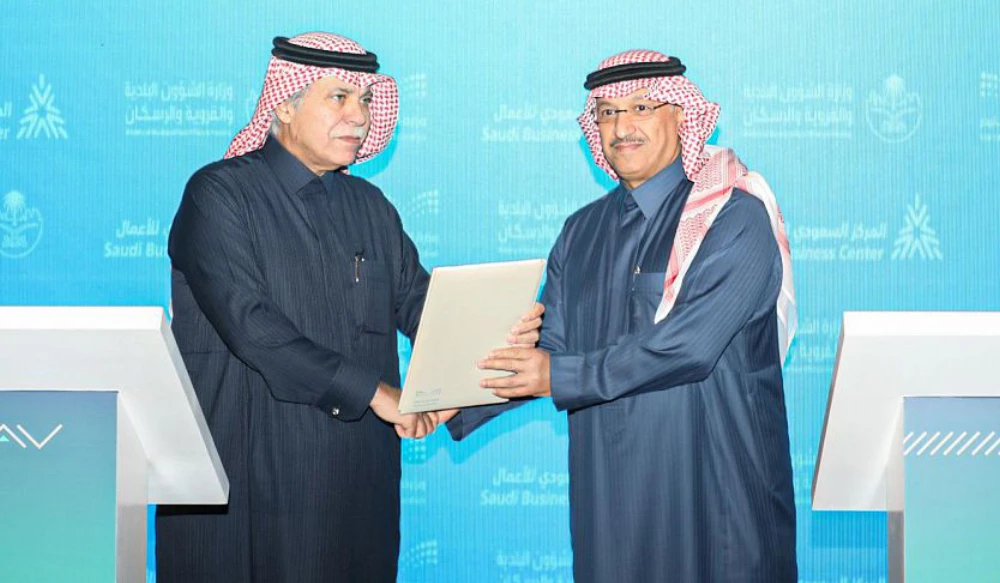 Saudi Education Minister Yousef Al-Benyan and Commerce Minister Majid bin Abdullah Al-Qasabi inaugurated the Saudi Business Center in Riyadh. (SPA)
