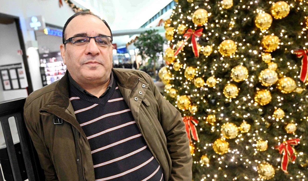 Exiled Turkish journalist Bulent Kenes poses for a photographer in Stockholm. (AFP)