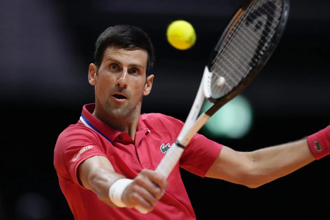 Serbia’s Novak Djokovic of Falcons, returns the ball to Austria’s Sebastian Ofner of Kites, during a match of the World Tennis League at Coca-Cola Arena, in Dubai on Dec. 23, 2022. (AP)
