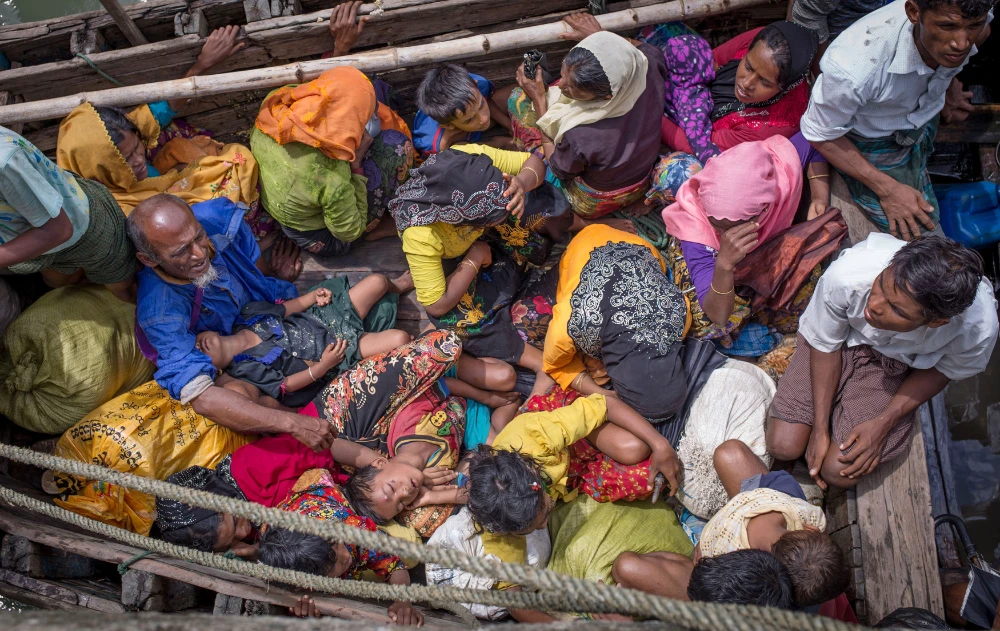 Calls mount on Indonesia to rescue hundreds of Rohingya stranded at sea
