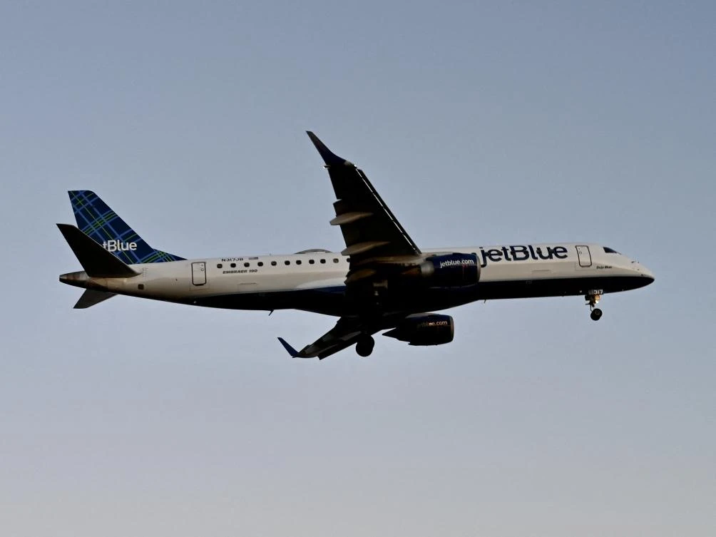 Emergency responders evacuated a JetBlue flight at JFK International Airport in New York City. (AFP)