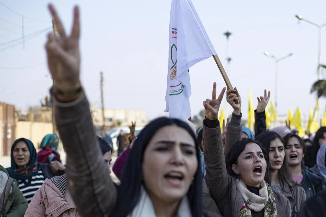 Hundreds of Syrian Kurds protest in Hasakeh in response to a deadly attack targeting members of the ethnic community in Paris. (AFP)