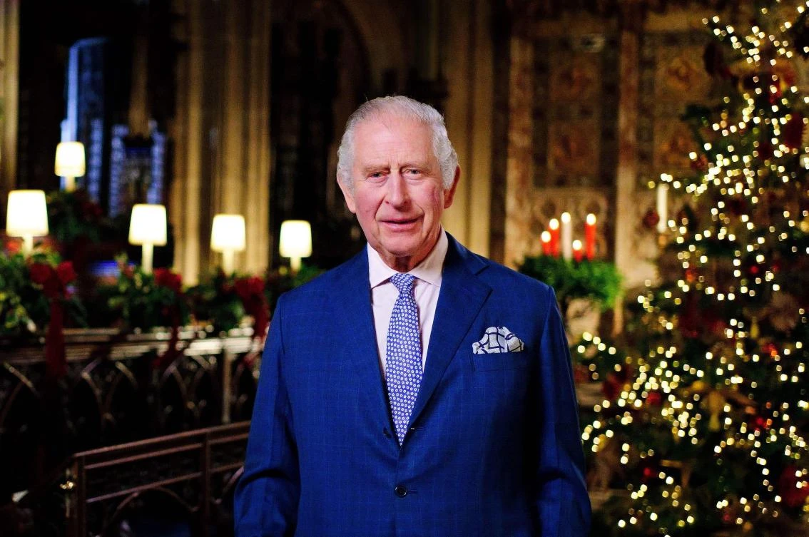 Britain’s King Charles III poses for a photograph during the recording of his first annual Christmas Day message, in the Quire of St. George’s Chapel at Windsor Castle, west of London on December 13, 2022. (AFP)