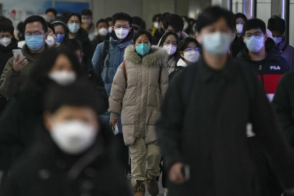 Beijing, Shanghai residents back to work as China eases into living with COVID-19