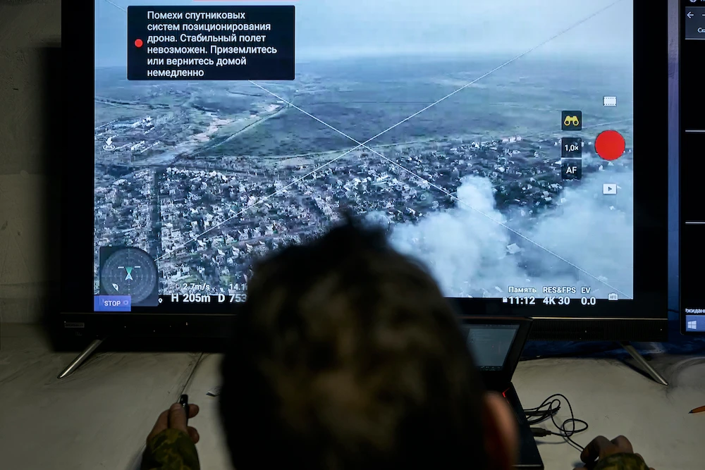 Above, a Ukrainian soldier watches a drone feed from an underground command center in Bakhmut, Donetsk region, Ukraine on Dec. 25, 2022. (AP)