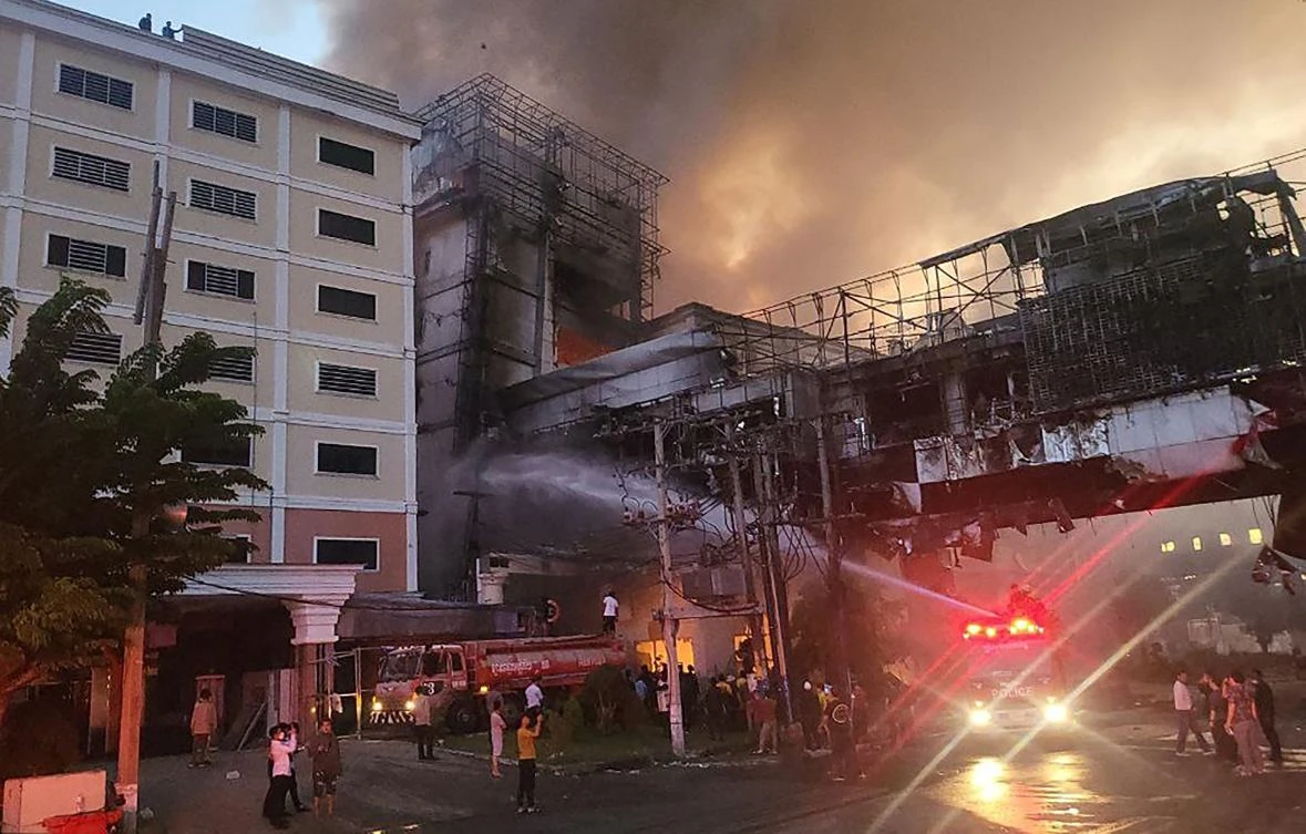 Cambodian authorities have requested help to deal with the fire from Thailand, which sent five firetrucks and 10 rescue vans. (AFP)
